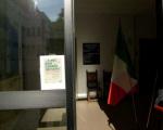 La locandina dell'iniziativa affissa presso l'ingresso dell'Archivio Storico del Comune di Bologna.